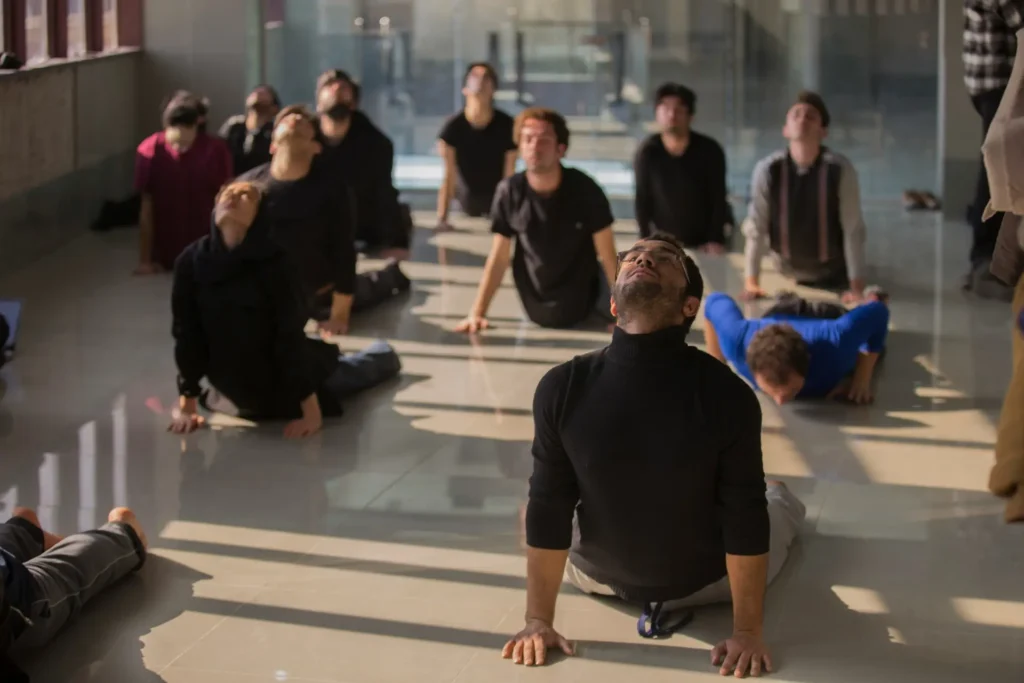 A person practicing yoga, focusing on flexibility and mindfulness, as part of a holistic approach to beauty and wellness.
