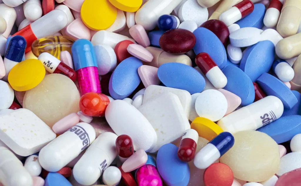 Various supplement, comparing labels to choose the right vitamins for the health and wellness goals.